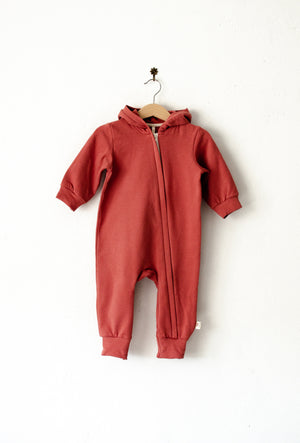 Hooded jumpsuit with a zip